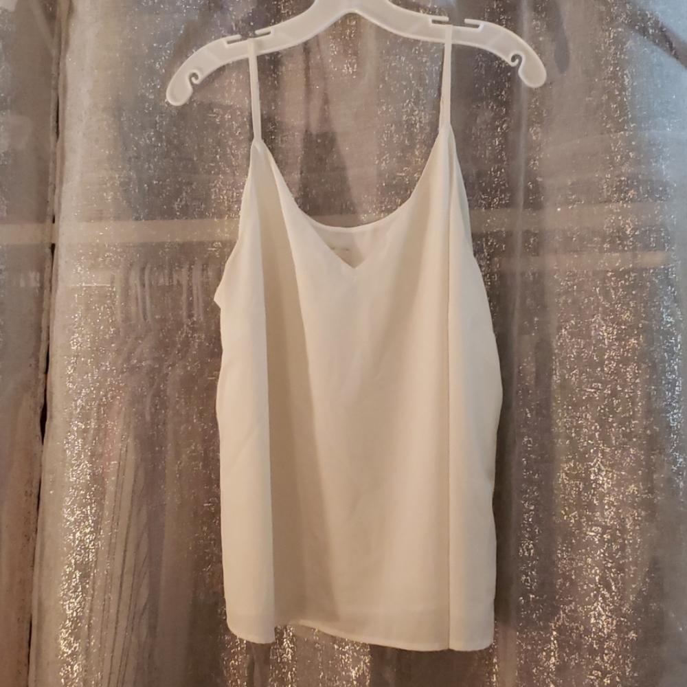 White sleeveless blouse